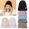 Colorful toddler knit beanie hat for boys and girls, warm winter cap from Everything Baby, suitable for kids aged 4-8 years.