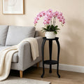 Heavy-duty iron plant stand with 9-inch diameter, rustproof coating, and non-scratch feet for indoor or outdoor use.