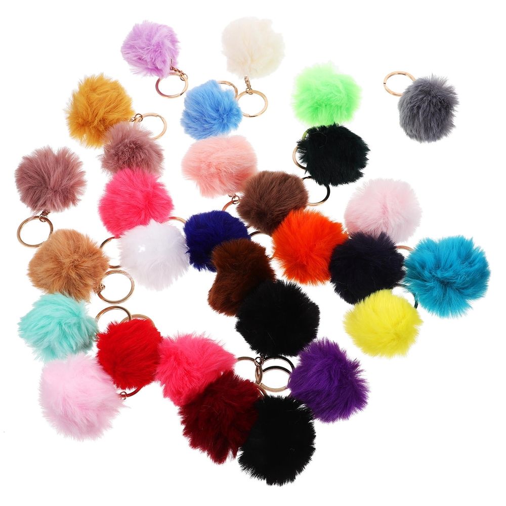 Colorful pom pom keychain set by Everything Baby with cute bag charms and key accessories for women, teens, and girls.