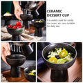 Japanese-style black ceramic dessert bowl with smooth rim, ideal for serving sweets, from Everything Baby, designed for elegant tableware.