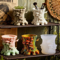 Large silicone resin mold with mushroom, tree stump, and flower pot shapes for DIY planters, candles, and crafts.