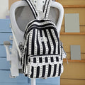 Green Stripe School Backpack with bowknot and lace trim, spacious kid's backpack for travel, college, or everyday use by Everything Baby.