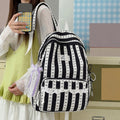 Green Stripe School Backpack with bowknot, lace trim, spacious design for kids, ideal for school, travel, and college.