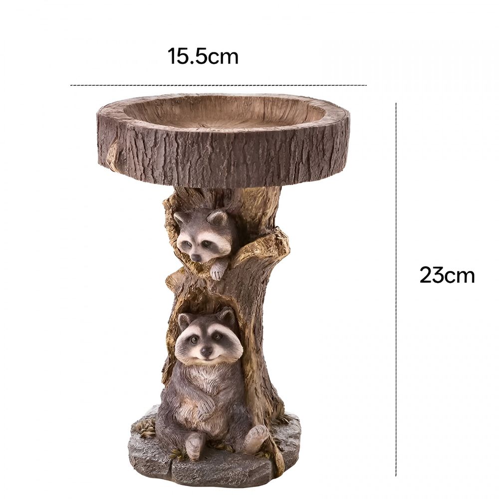 Polyresin raccoon-shaped birdbath for garden, decorative antique-style outdoor bird bath for yard and home garden decor.