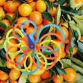 Plastic fruit measuring laps set for oranges and peaches, ideal for baby feeding, by Everything Baby.