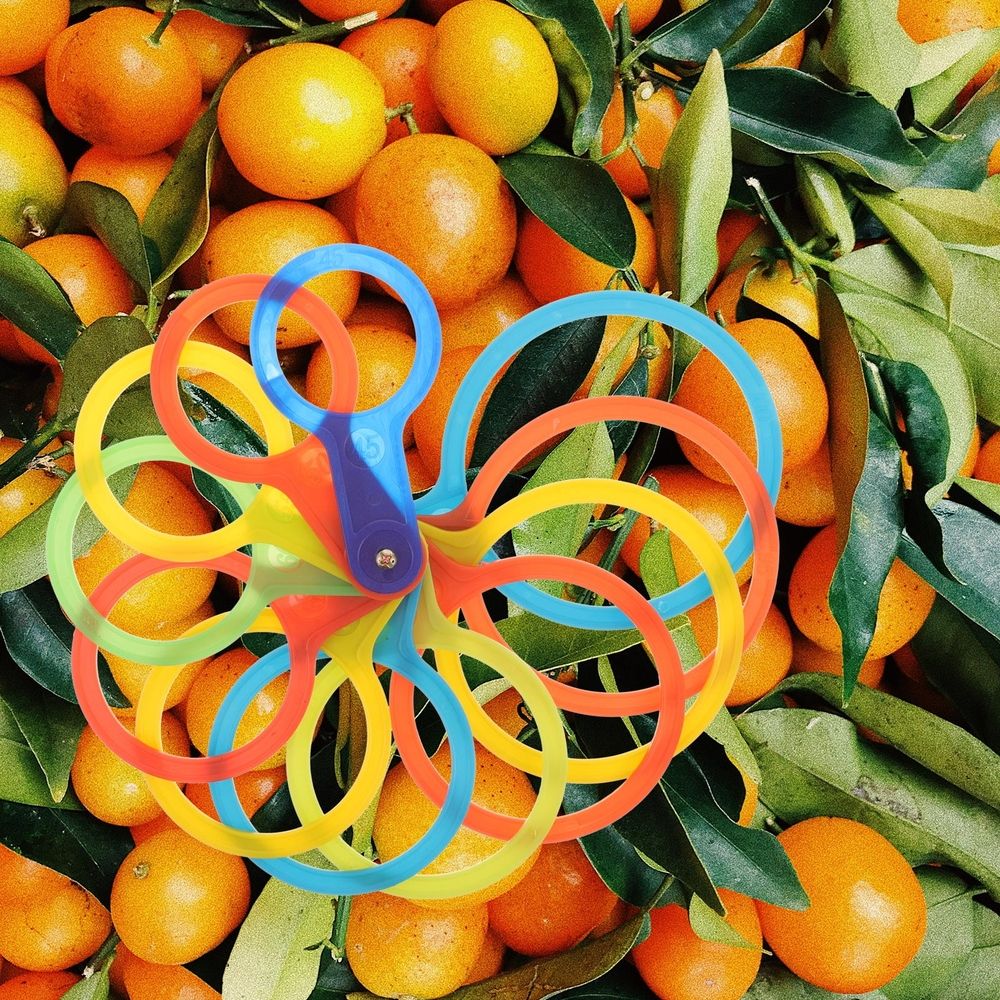 Plastic fruit measuring laps set for oranges and peaches, ideal for baby feeding, by Everything Baby.