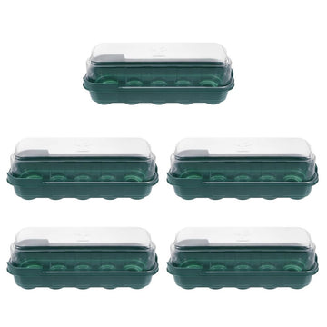 Green germination tray set with moisture control and transparent cover for seed starting, ideal for gardening and plant propagation.