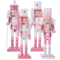 Set of four collectible wooden nutcracker puppets by Everything Baby, festive holiday decor for kids and toy collection.
