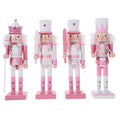 Set of four collectible wood nutcracker puppets from Everything Baby, festive holiday decor, ideal for kids' play and decoration.