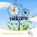 Colorful iron bike garden stake from Everything Baby, suitable for outdoor decor and garden ornamentation.