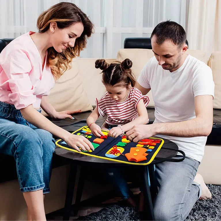 Multicolour Montessori busy board for toddlers, blue sensory activity toy with various interactive elements for early learning.