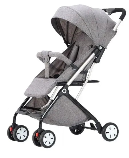 Lightweight black and grey foldable baby stroller in compact travel design, suitable for infants and toddlers, by Everything Baby.
