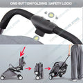 Lightweight compact baby stroller in black and grey with foldable travel design from Everything Baby, suitable for infants and toddlers.