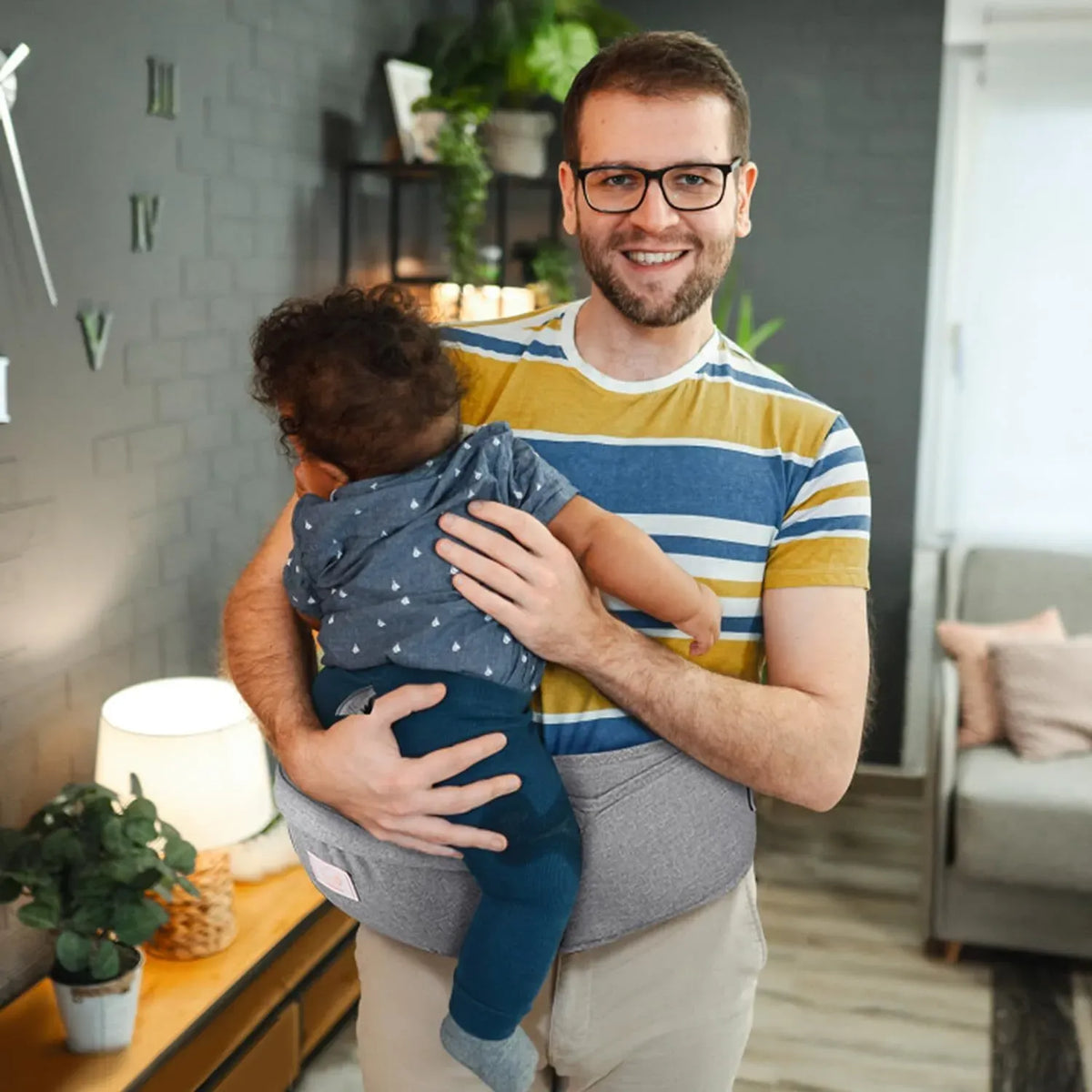 Blue adjustable baby carrier waist sling by Everything Baby, lightweight hip seat for babies aged 0-36 months, ideal for hands-free carrying.