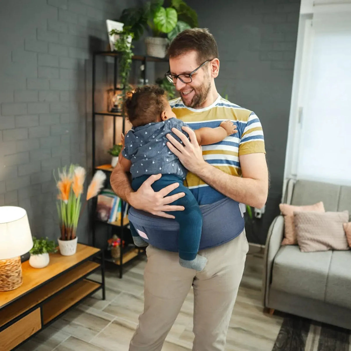 Blue adjustable baby carrier waist sling from Everything Baby, lightweight hip seat for infants and toddlers up to 36 months.