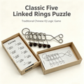 Collectible mechanical brain teaser with five linked rings, designed as retro desktop decor, from Everything Baby's activity toy collection.