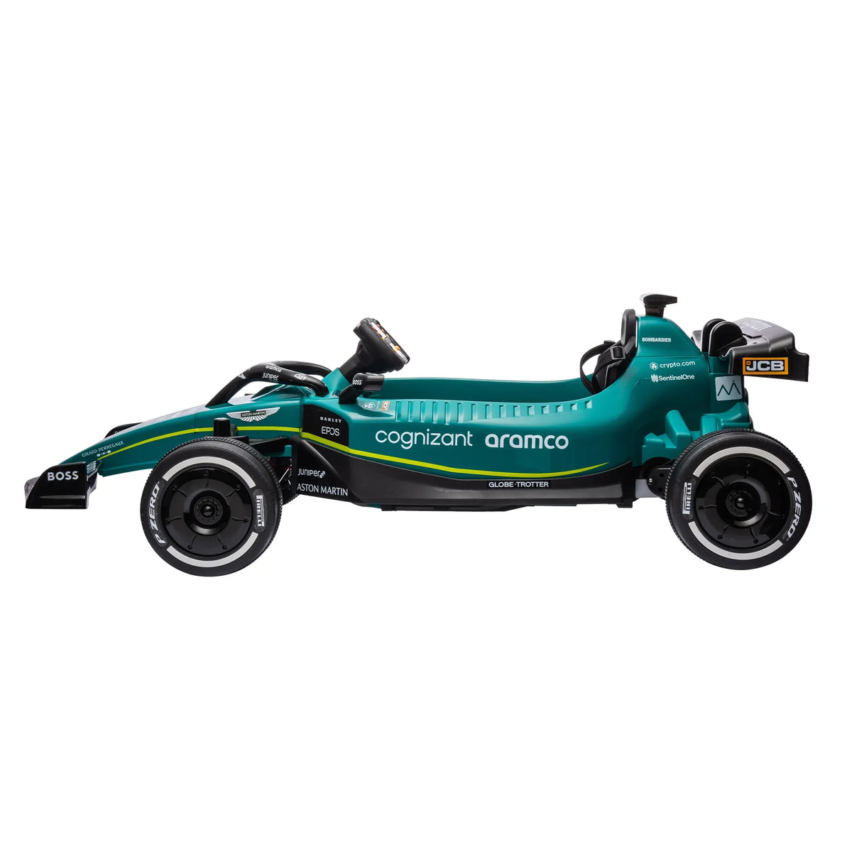 Little boy riding a green Kahuna Aston Martin Aramco F1 licensed electric kids race car, designed for young children.