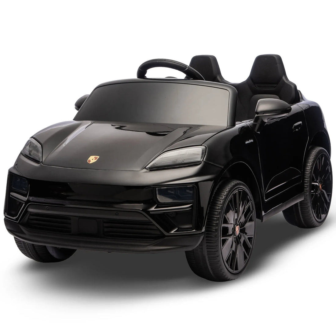 Black Porsche Macan Turbo EV kids ride-on car with 12V electric motor, featuring realistic design and sturdy construction for children.