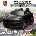 Black Porsche Macan Turbo EV kids ride-on car with 12V electric motor, featuring realistic design and brand details.