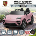 Pink Porsche Macan Turbo EV kids ride-on car with 12V electric motor, featuring realistic design and brand logo for children.