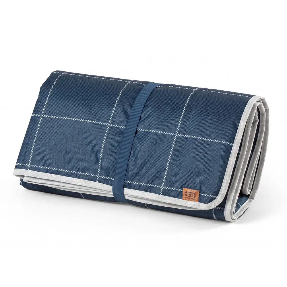 Blue waterproof picnic blanket by Everything Baby, ideal for outdoor meals with kids, featuring a soft, durable surface.