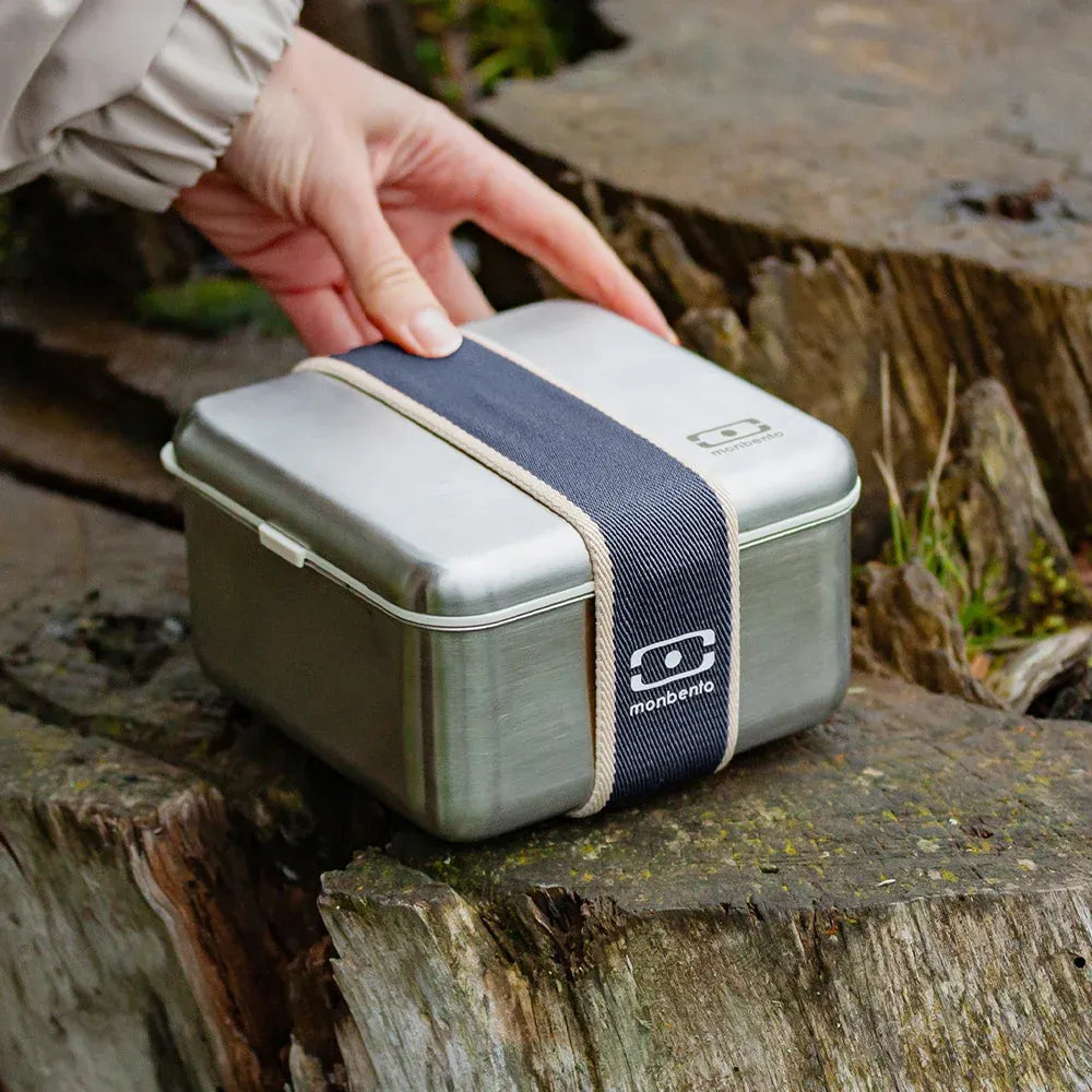 Natural blue Monbento MB Sense L metal lunch box, microwave-safe, designed for kids, with a sleek, durable construction.