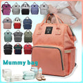 Navy luxury multifunctional diaper backpack by Everything Baby with multiple compartments and changing pad for moms and babies.