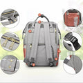 Luxury navy diaper nappy backpack by Everything Baby, multifunctional maternity bag with changing pad and multiple compartments.