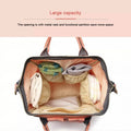Luxury navy diaper nappy backpack by Everything Baby, multifunctional maternity and mummy changing bag with stroller attachment.