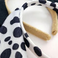 Baby's bear costume dress-up set with tail, bowtie, and ears for pretend play and costume parties by Everything Baby.