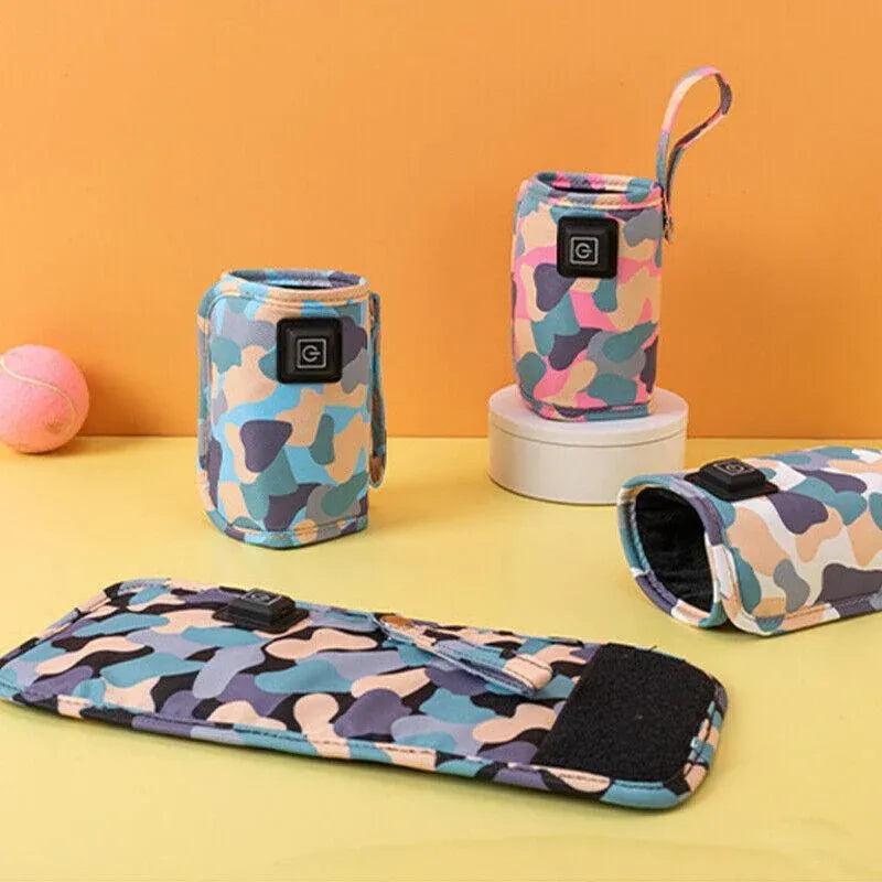 Pink portable USB milk warmer bag for baby bottles, compact travel feeding pouch by Everything Baby.