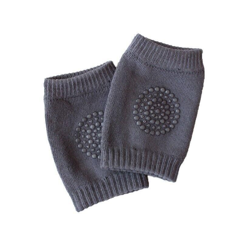 Dark grey crawling knee pads for babies by Everything Baby, soft protective cushion for toddler legs during crawling.
