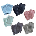 Dark grey crawling knee pads for babies and toddlers by Everything Baby, providing comfortable leg protection during play.