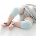 Dark grey crawling knee pads for babies from Everything Baby, soft protective cushions for toddler leg comfort and safety.