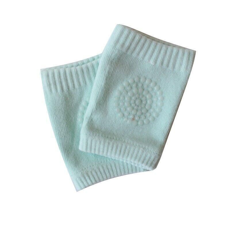 Green crawling knee pads for babies by Everything Baby, soft protective cushion for toddler legs during play and crawling.