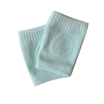 Green crawling knee pads for babies by Everything Baby, soft protective cushion for toddler legs during play and crawling.