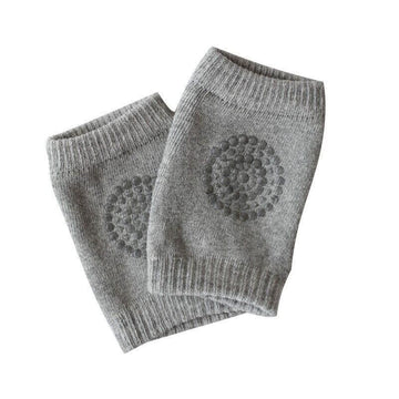 Light grey crawling knee pads for babies by Everything Baby, padded protectors for toddler legs and knees during play.