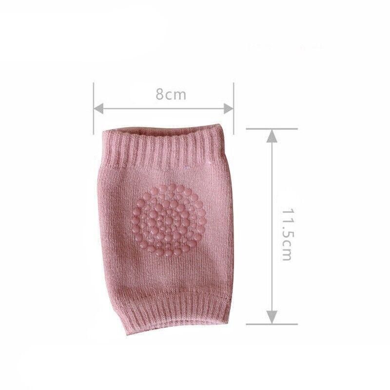 Light grey crawling knee pads for babies by Everything Baby, featuring soft protective cushions for toddler leg comfort.