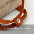 Khaki Mini Dinosaur backpack for kids, featuring a cute dinosaur design, suitable for early learners and daily outings.