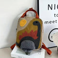 Khaki mini dinosaur backpack for kids, 21x10x26cm, with dinosaur design, perfect for early learners and daily outings.