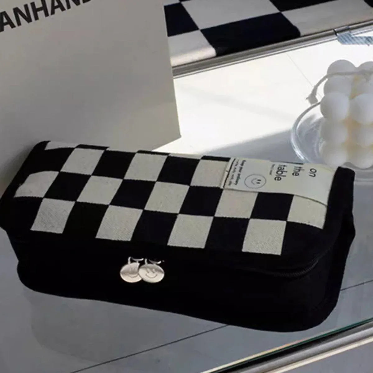 Two checkerboard pattern pencil cases by Everything Baby, large capacity stationery bags for kids' school supplies.