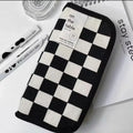 Two checkerboard pattern pencil cases by Everything Baby, large capacity stationery bags for kids' pens and pencils.