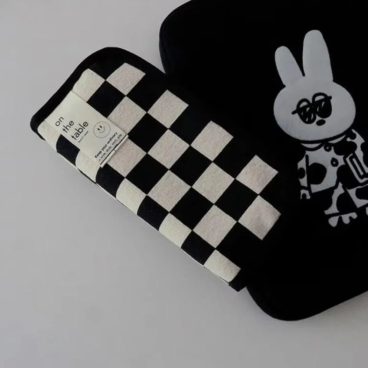 Two checkerboard design pencil cases from Everything Baby, spacious stationery bags for kids' pens and pencils.