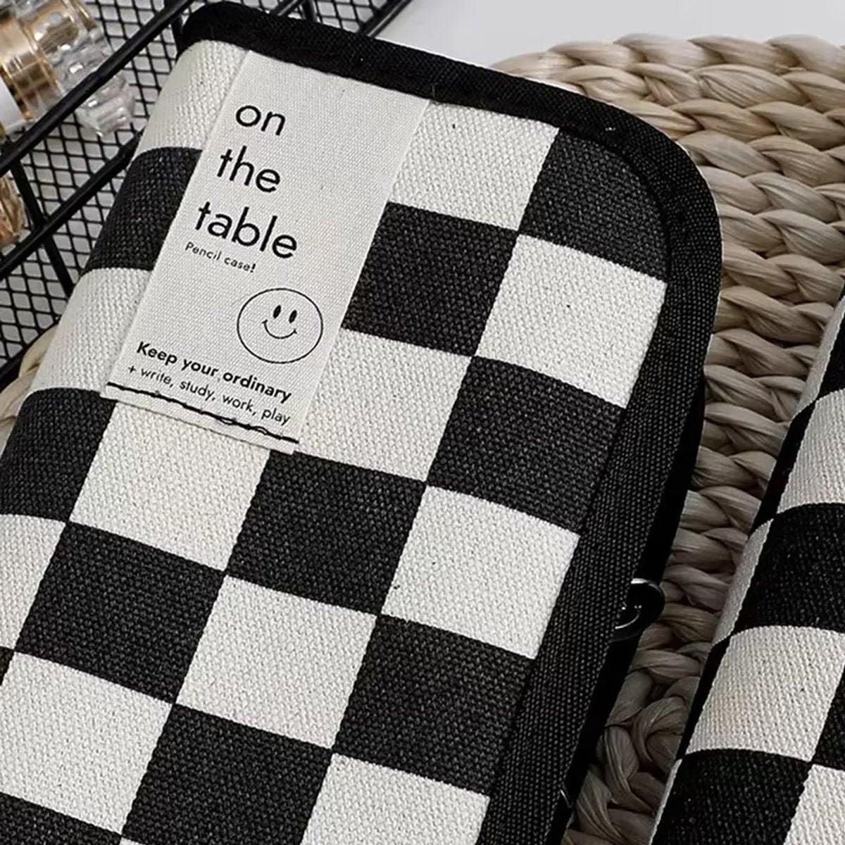 Two checkerboard pattern pencil cases by Everything Baby, large capacity stationery bags for kids and students.