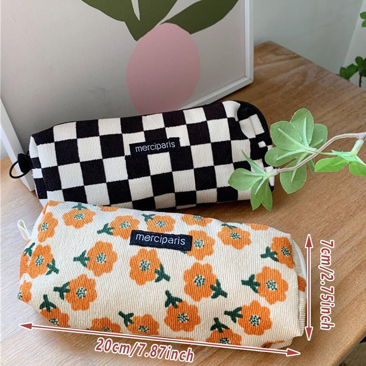 Small blue floral pencil case by Everything Baby, spacious stationery holder with large capacity for school and travel use.