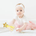 Set of four sequin fairy wands with magic pentagram designs, perfect for kids' pretend play and party favors.