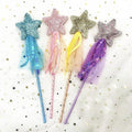 Set of four sequin fairy wands with magic pentagram design for kids' pretend play and party favor by Everything Baby.