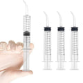 Set of 4 disposable dental syringes with curved tips for oral irrigation, suitable for baby and kids dental care by Everything Baby.