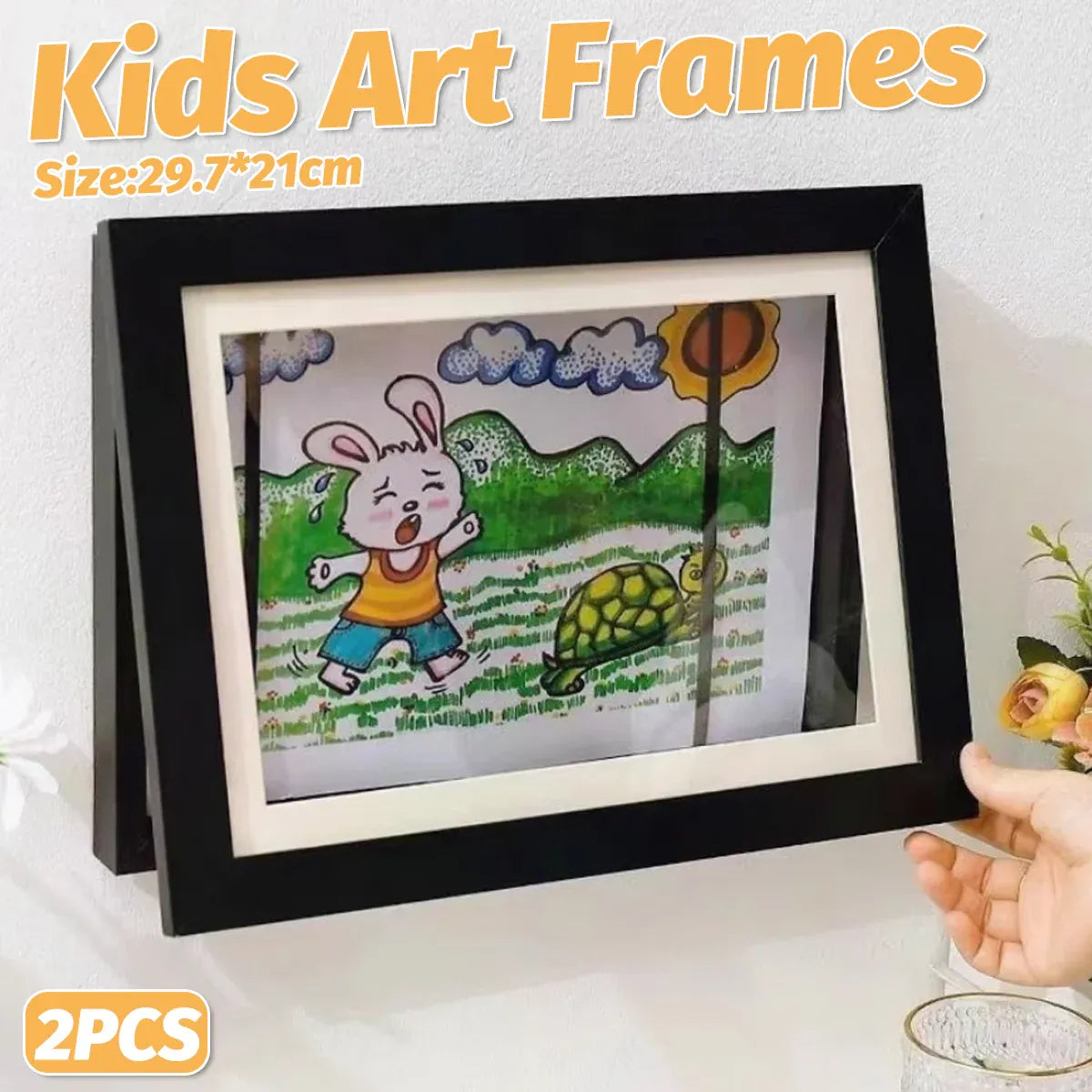 Set of two black wooden art display frames for kids' artwork, ideal for storing and showcasing drawings and creative projects.