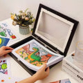 Set of two black wooden art display frames by Everything Baby for showcasing kids' artwork and drawings.